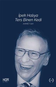 İpek Halıya Ters Binen Kedi İpek Halıya Ters Binen Kedi